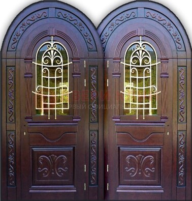 Индивидуальная арочная дверь со стеклом и ковкой ДА-19 в Наро-Фоминске