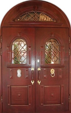 Стальная арочная дверь со стеклом и ковкой ДА-30 в дом из кирпича в Балашихе