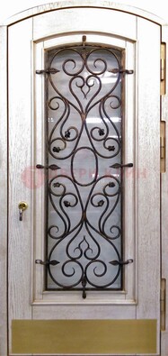 Железная дверь Винорит в форме арки со стеклом и ковкой ДА-53 в Наро-Фоминске