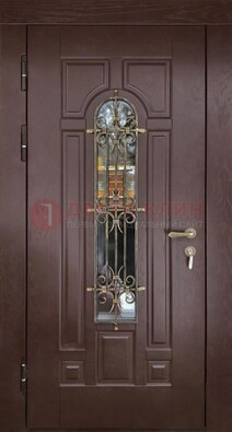 Темная железная дверь со стеклом и ковкой для частного дома ДСК-156 в Наро-Фоминске