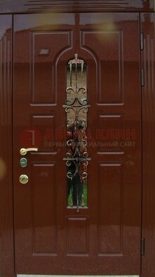 Красивая металлическая дверь со стеклом и ковкой ДСК-33 в Наро-Фоминске