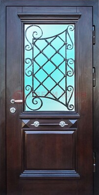 Коттеджная металлическая дверь со стеклом и ковкой ДСК-57 в Краснодаре