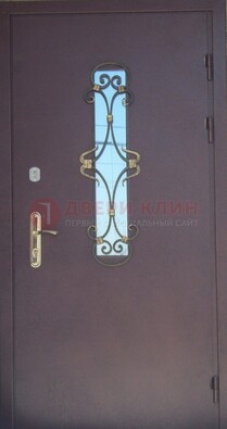Металлическая дверь со стеклом и ковкой ДСК-77 в Наро-Фоминске