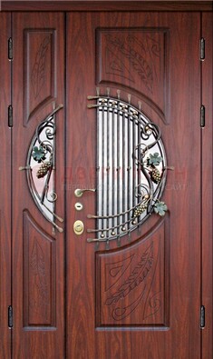 Железная дверь с виноритом и стеклом с ковкой ДВТ-170 в Наро-Фоминске